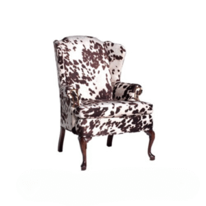 Caballero armchair rental in cowhide faux upholstery for rustic and western-themed events